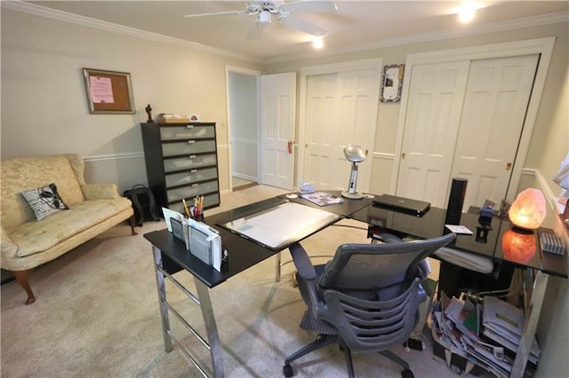 office area with light carpet, ornamental molding, and ceiling fan