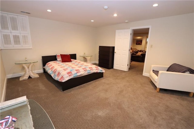 bedroom featuring light colored carpet