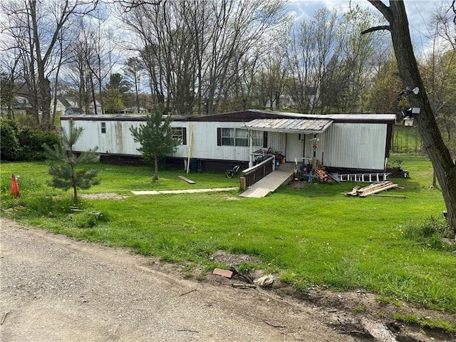 exterior space with a yard