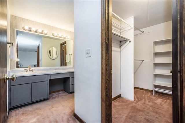 bathroom featuring oversized vanity