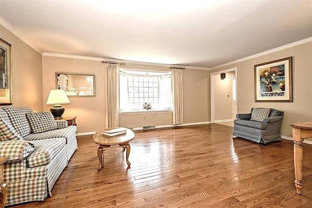 interior space with dark hardwood / wood-style flooring and ornamental molding