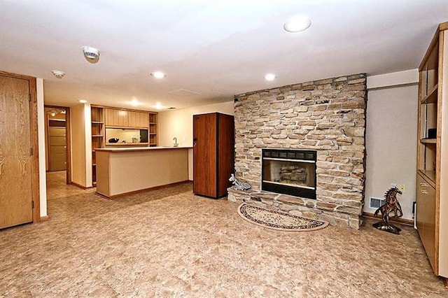 unfurnished living room with a fireplace and light colored carpet