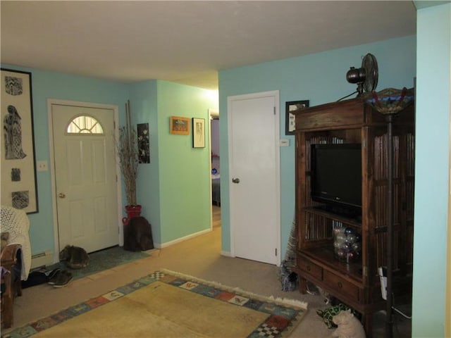 carpeted living room with a baseboard radiator