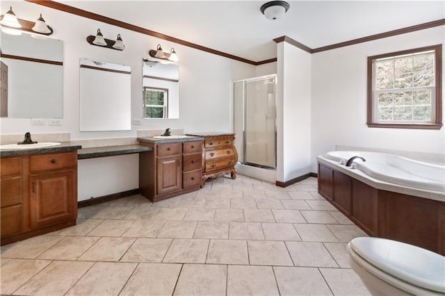 full bathroom featuring shower with separate bathtub, ornamental molding, toilet, and vanity with extensive cabinet space