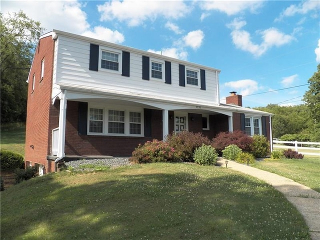 view of front facade with a front yard