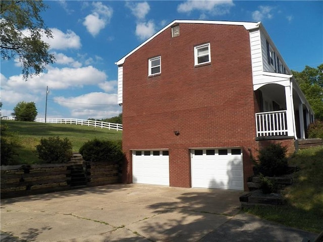 view of home's exterior featuring a garage