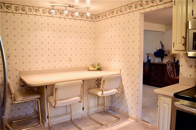 view of carpeted dining area