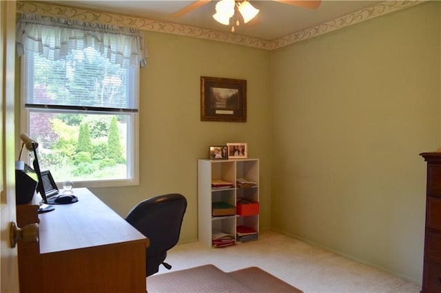 office area with light carpet and ceiling fan