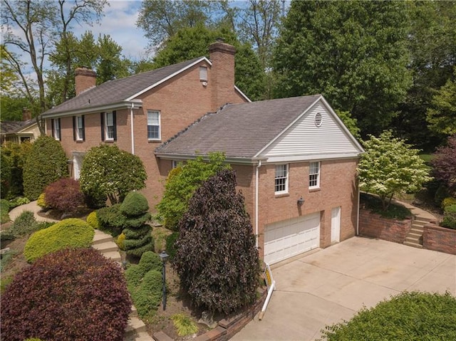 view of side of property featuring a garage