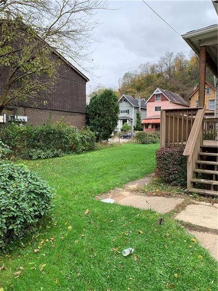 view of yard with a deck