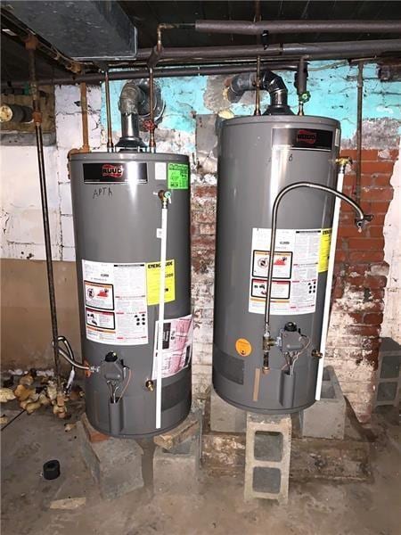 utility room featuring gas water heater