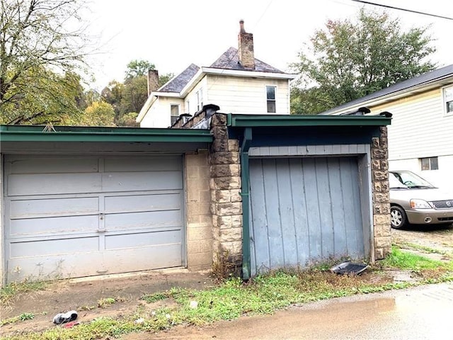 exterior space featuring a garage