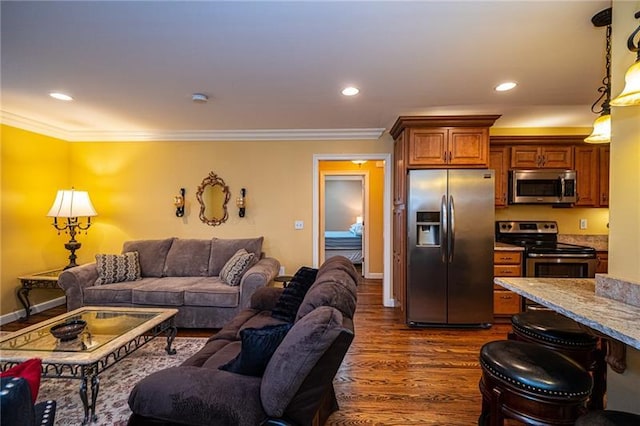 living room with dark wood-type flooring and crown molding