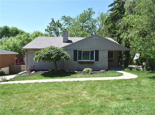 ranch-style home featuring a front yard