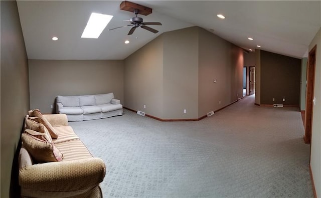 interior space with lofted ceiling with skylight and ceiling fan