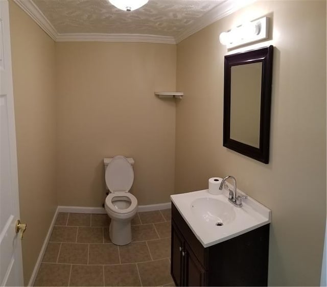 bathroom with toilet, crown molding, tile floors, a textured ceiling, and vanity