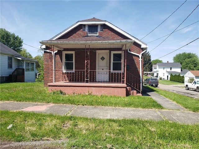 bungalow-style home featuring a porch