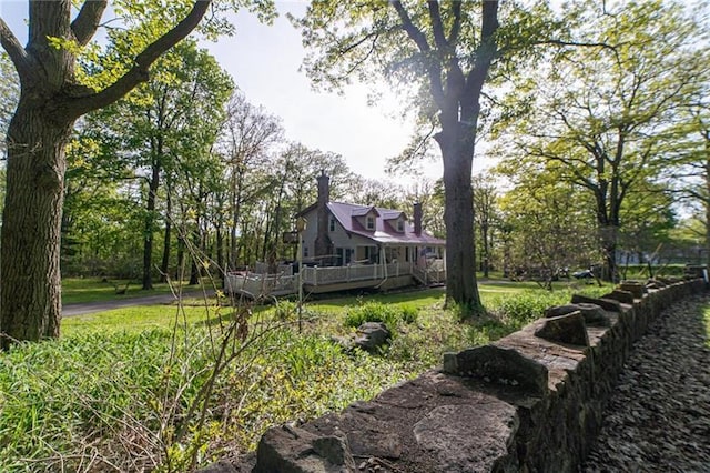 view of yard with a deck