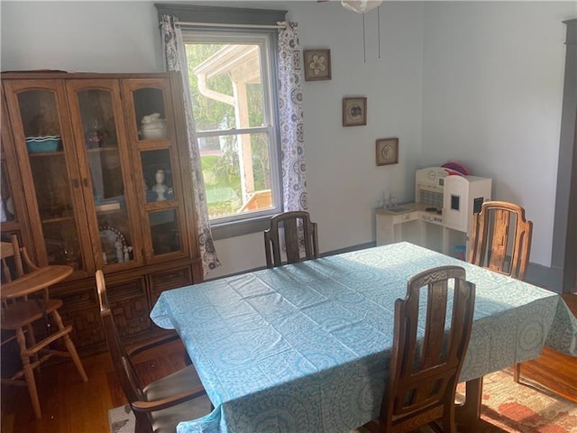 dining area featuring hardwood / wood-style flooring