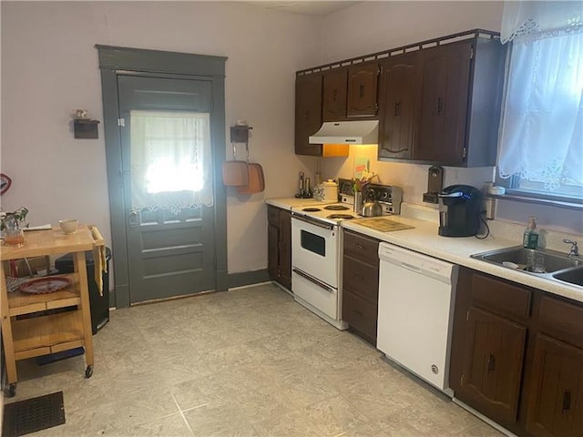 kitchen with light tile flooring, white appliances, sink, ventilation hood, and dark brown cabinetry