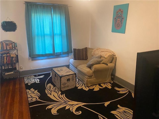 living area with wood-type flooring