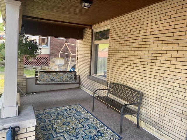 view of terrace featuring a porch