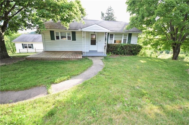 ranch-style house with a front lawn