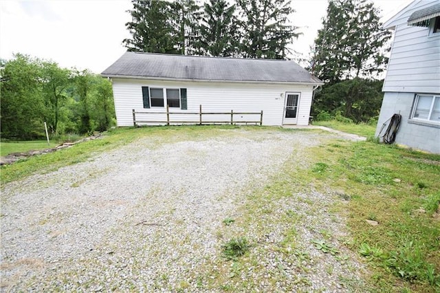 view of shed / structure with a lawn