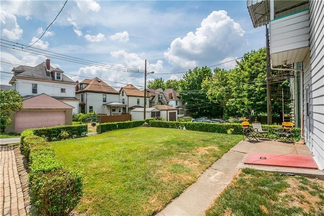 view of yard with a garage