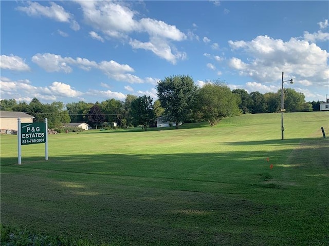 view of nearby features with a lawn