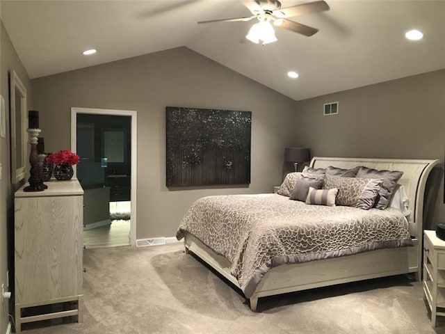 carpeted bedroom with lofted ceiling and ceiling fan