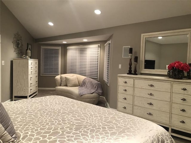 carpeted bedroom featuring vaulted ceiling