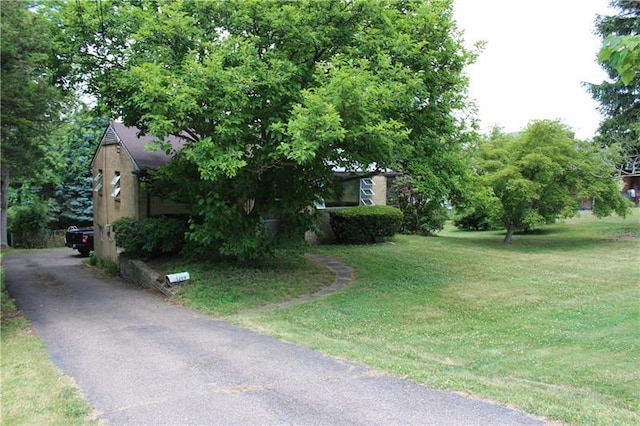 view of front of home with a front yard