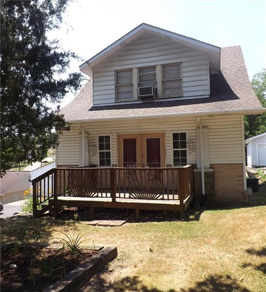 exterior space featuring a front yard