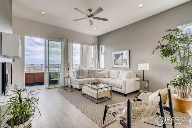 living room featuring ceiling fan