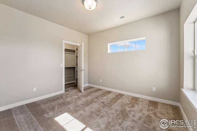 938 Schlagel St Unit 7, Fort Collins, CO 80524 - unfurnished bedroom with baseboards, carpet flooring, and visible vents
