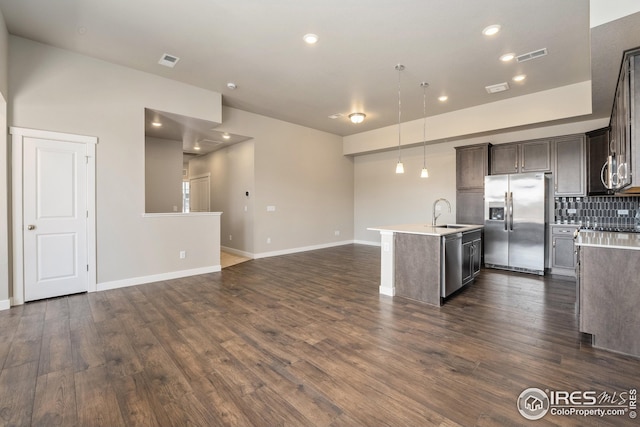 938 Schlagel St Unit 7, Fort Collins, CO 80524 - kitchen featuring dark wood-type flooring, visible vents, a sink, and stainless steel appliances