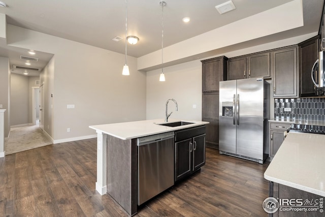 938 Schlagel St Unit 7, Fort Collins, CO 80524 - kitchen with light countertops, a sink, dark wood finished floors, stainless steel appliances, and visible vents