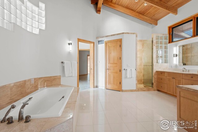 bathroom featuring wood ceiling, vanity, beam ceiling, and independent shower and bath