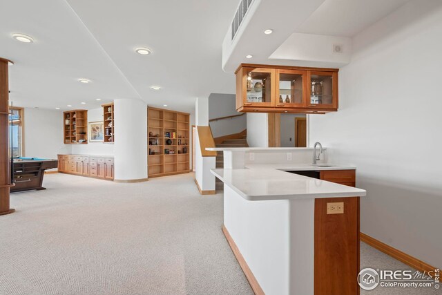 bar featuring light colored carpet, pool table, and sink