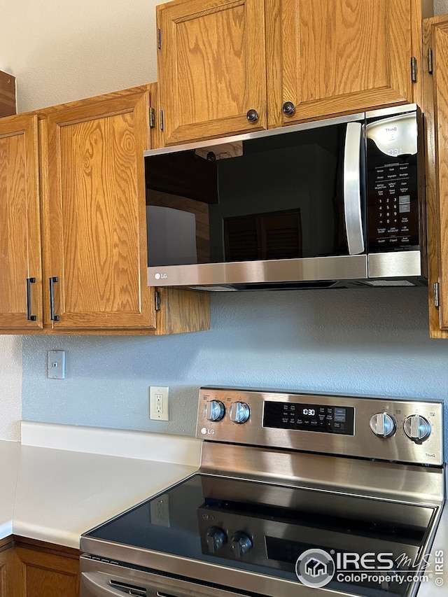 kitchen with appliances with stainless steel finishes