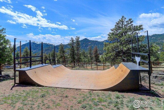 exterior space featuring a mountain view