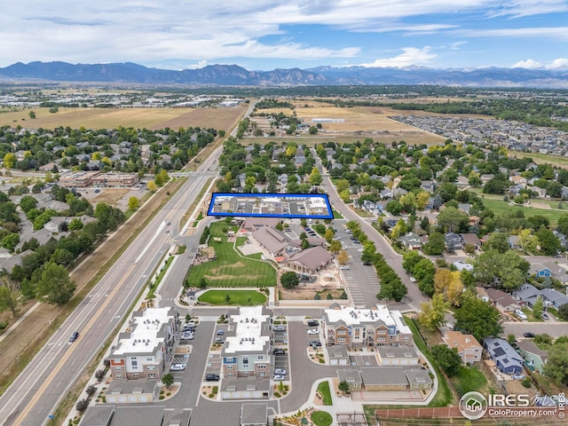 bird's eye view with a mountain view