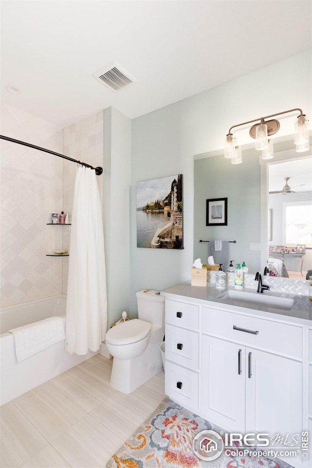 full bathroom featuring ceiling fan, toilet, vanity, and shower / bathtub combination with curtain