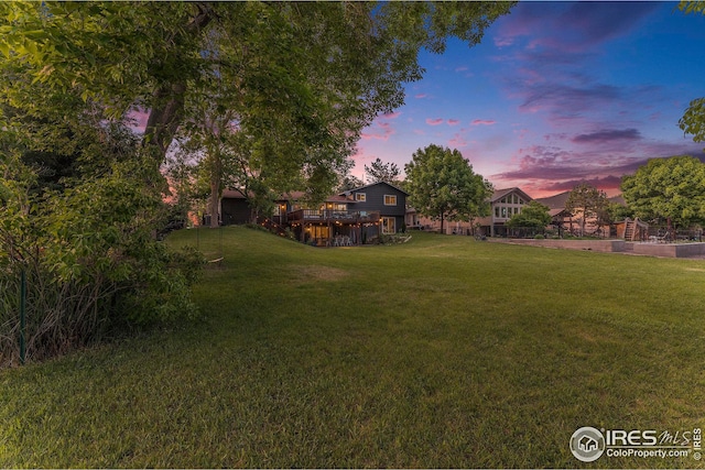 view of yard featuring a wooden deck