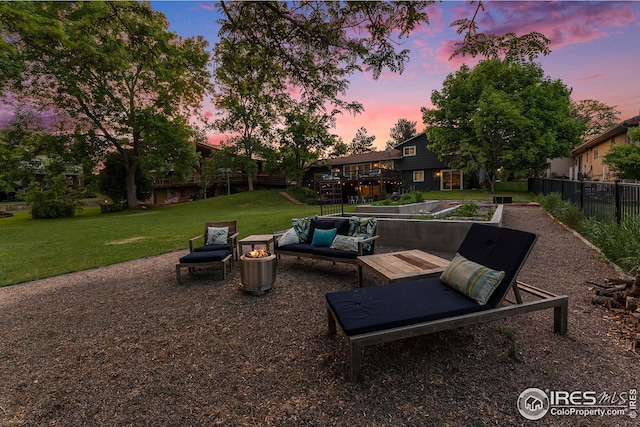 exterior space featuring a garden and a fenced backyard