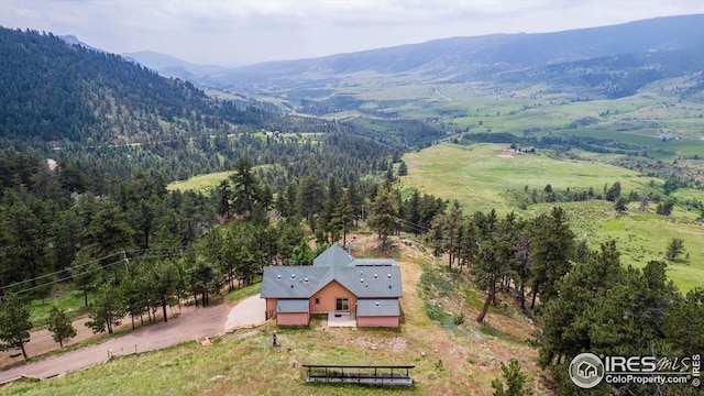 aerial view featuring a mountain view and a rural view