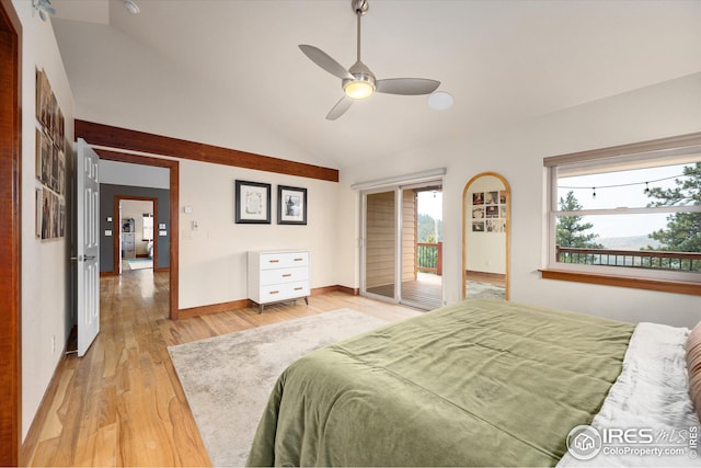 bedroom featuring multiple windows, ceiling fan, lofted ceiling, and light hardwood / wood-style floors