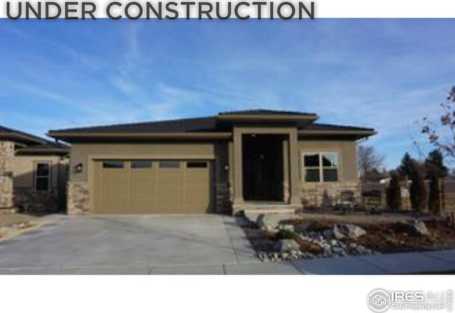 prairie-style house with a garage