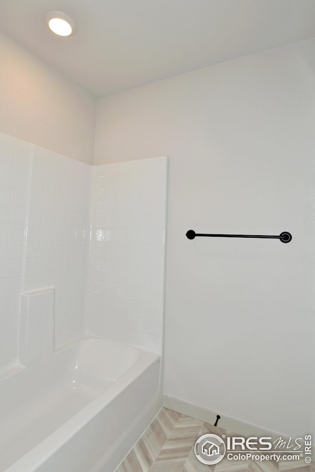 bathroom with shower / tub combination